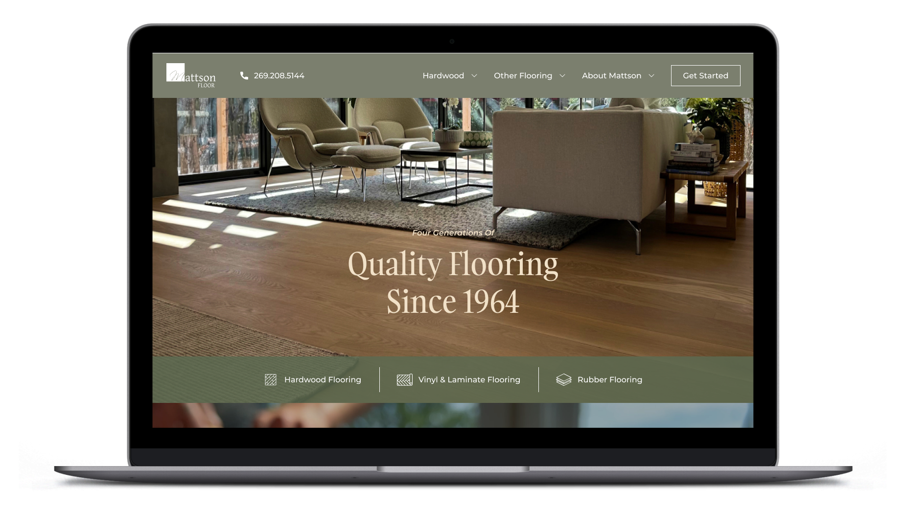 Image of desktop computer with flooring company website homepage